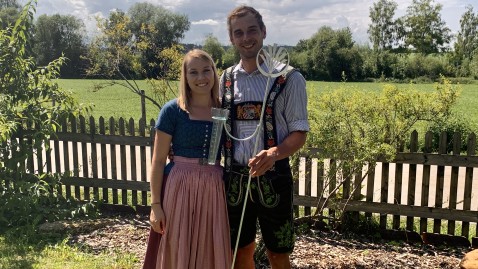 Hofübernehmer mit Regenmesser
